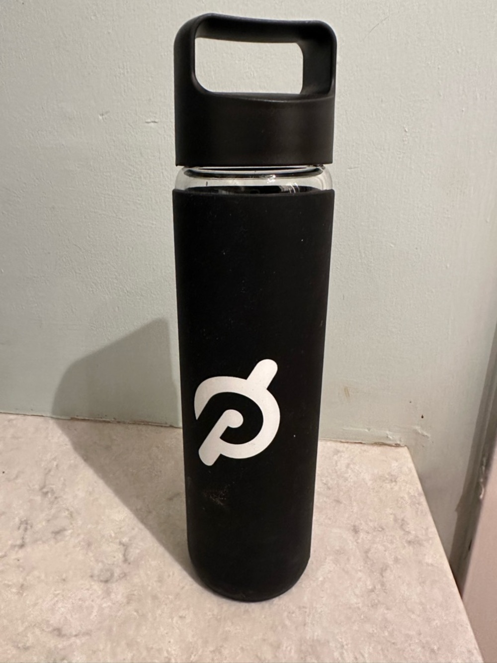 Peloton Black Water Bottle with White Logo and Carry Cap